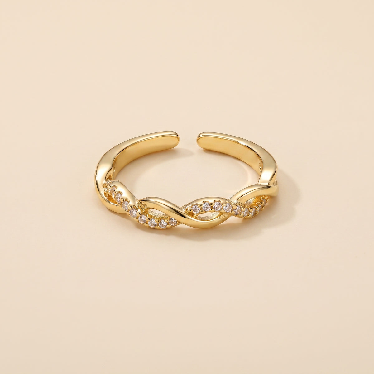 Bague Ajustable Torsadée Dorée, bague en acier doré Maison Orena — vue de face