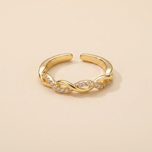 Bague Ajustable Torsadée Dorée, bague en acier doré Maison Orena — vue de face